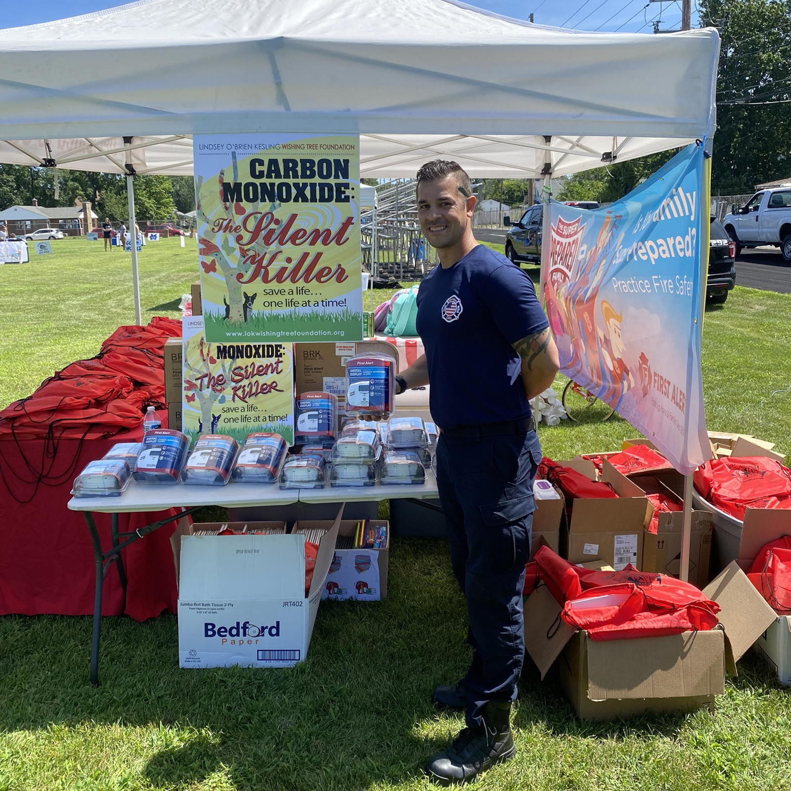480859508_946302127683345_4629747456839264295_n-scaled Michigan City firefighter stands at a carbon monoxide awareness booth during a public safety event